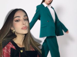donna che indossa tailleur e rosa perrotta