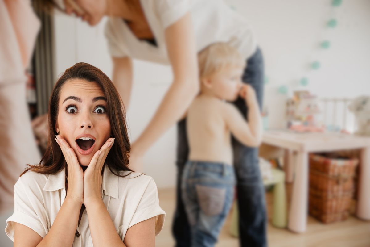 mamma che veste bambino e donna sorpresa